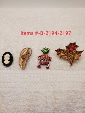 4 Brooches, items # B-2194-2197,. wt 28 grams.